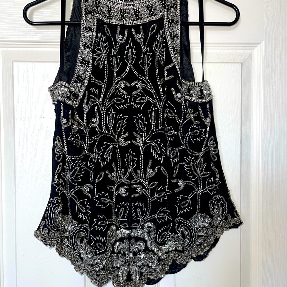 Beautiful top made of sequins and beads.